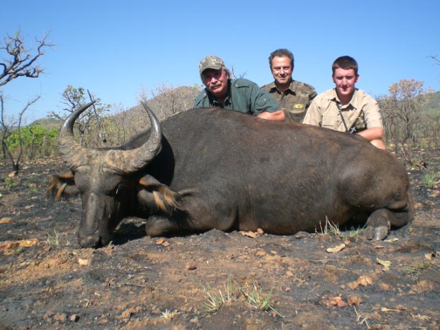 Ken Wilson and the West African Savanna Buffalo he hunted with Faro East in 2009
